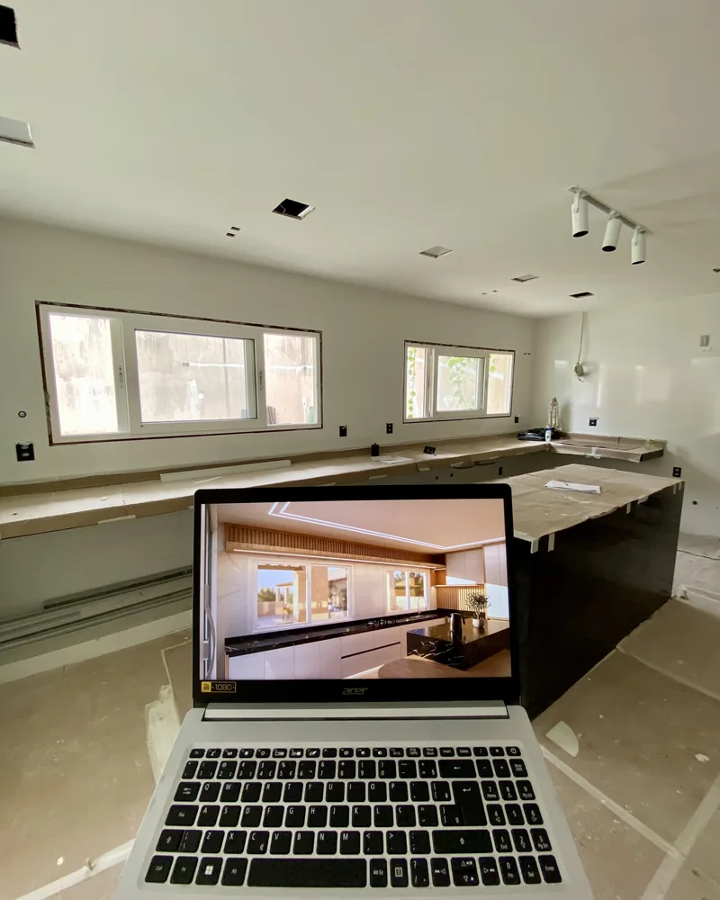 Acompanhamento de obra com projeto 3D fotorrealista em laptop na cozinha em reforma pela OPUS
